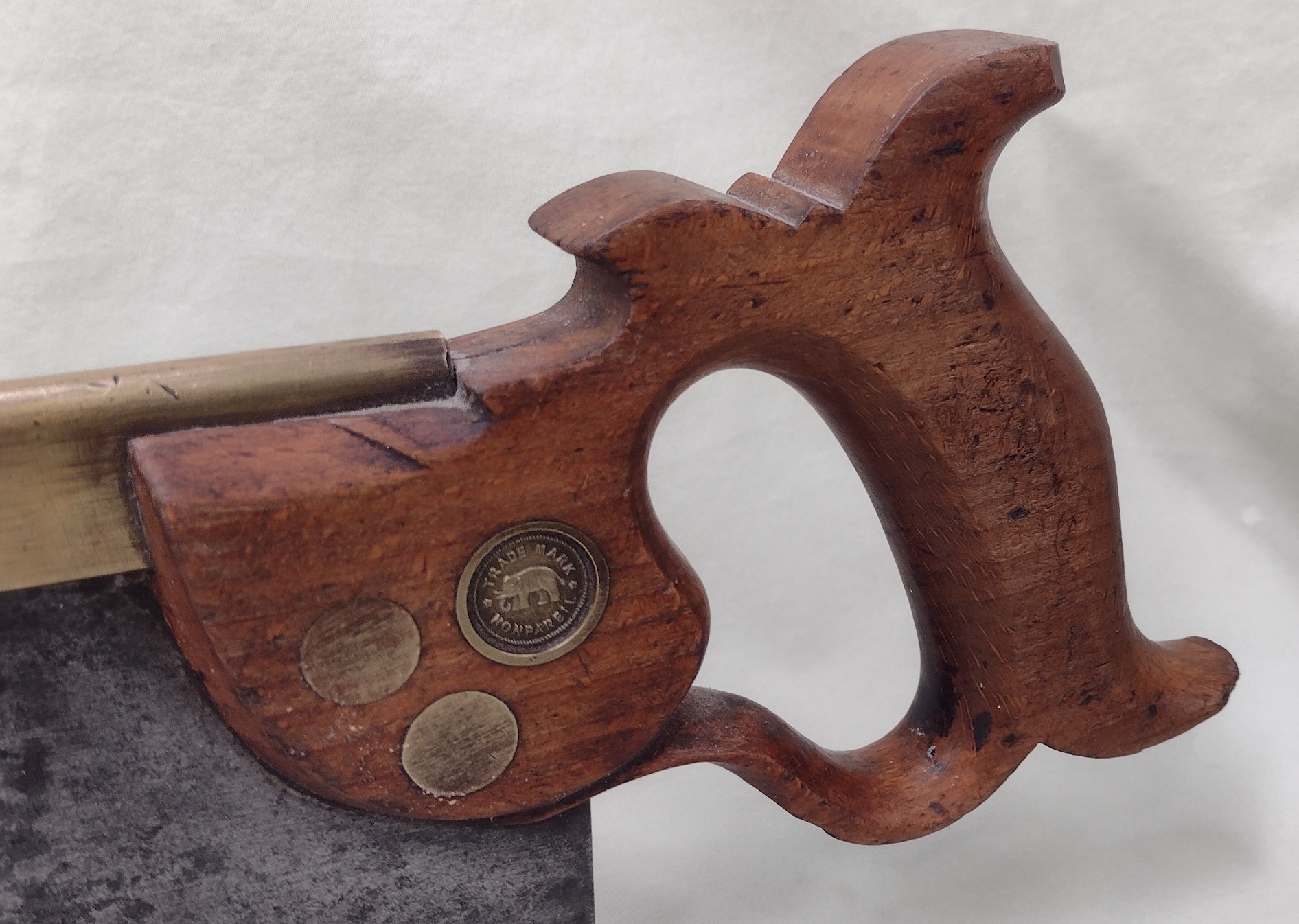 A Tyzack and Turner saw handle.