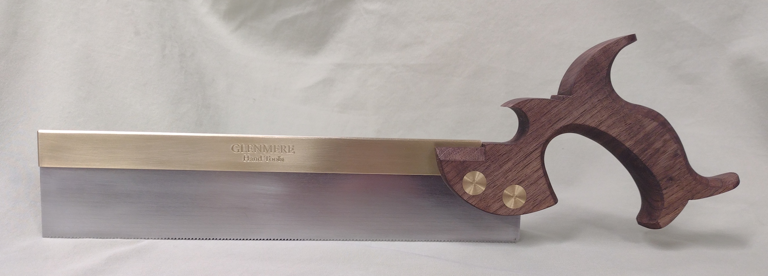 a walnut handled dovetail saw